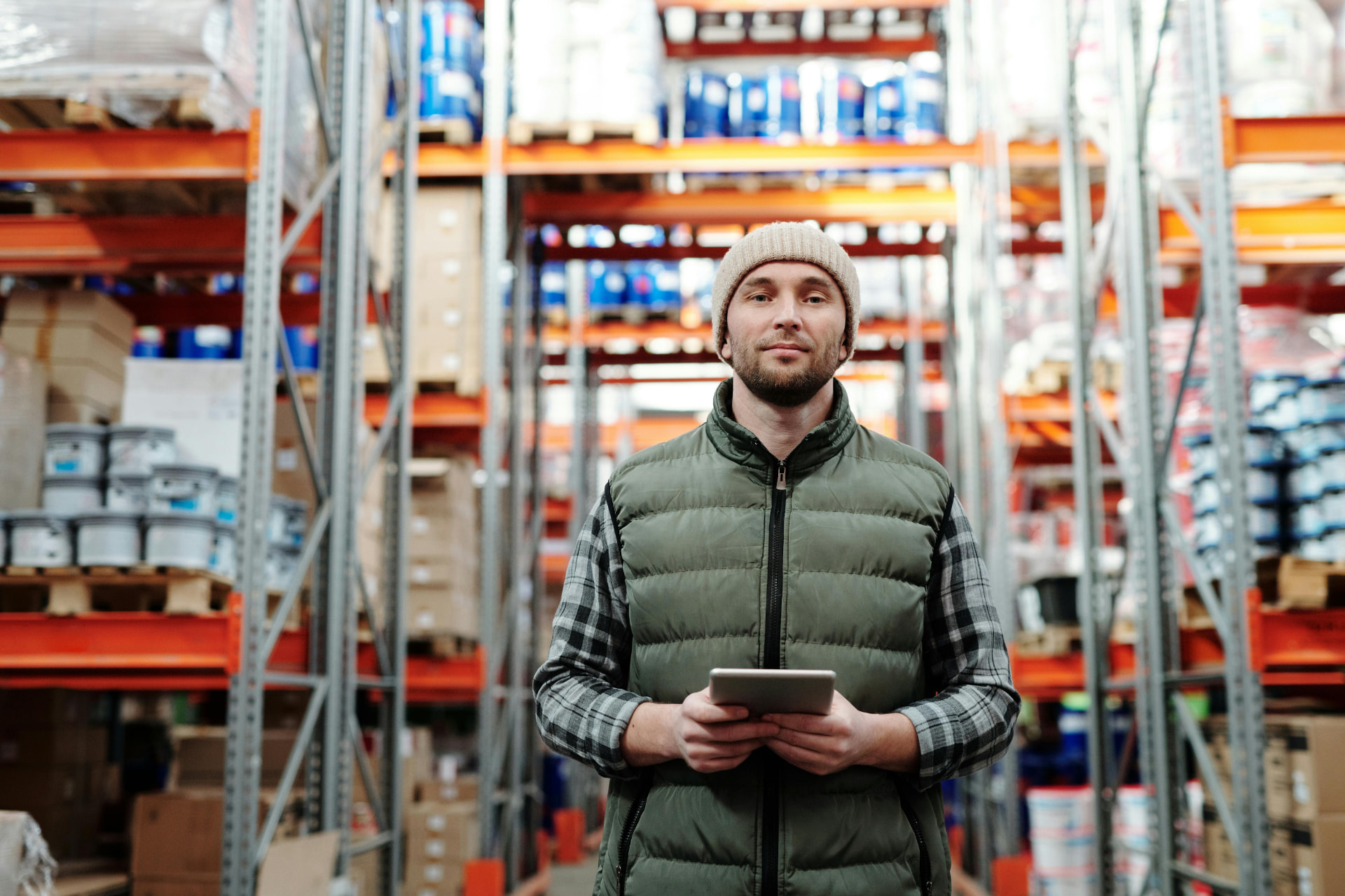 Warehouse professional managing inventory with a tablet